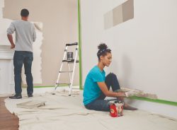 man and woman couple painting walls with Lifestyle_Paint