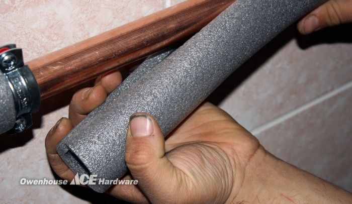 Foam pipe insulation protecting plumbing from freezing temperatures in Bozeman