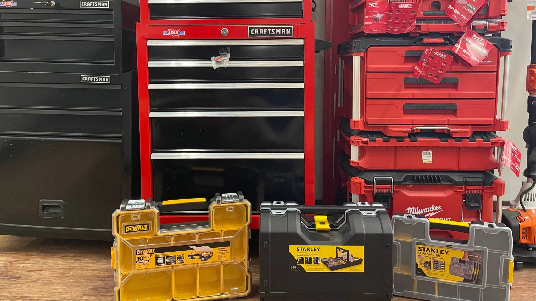 garage storage with craftsman drawers, stanley, dewalt and milwaukee organizing bins