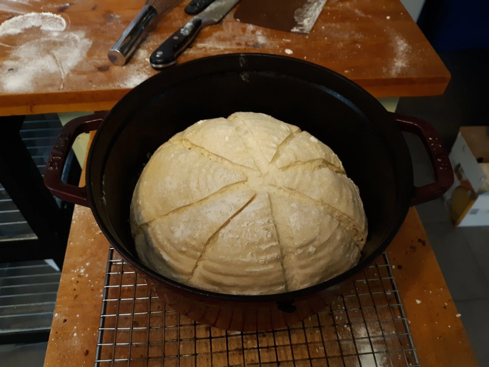 scoring bread dough before heating in the oven